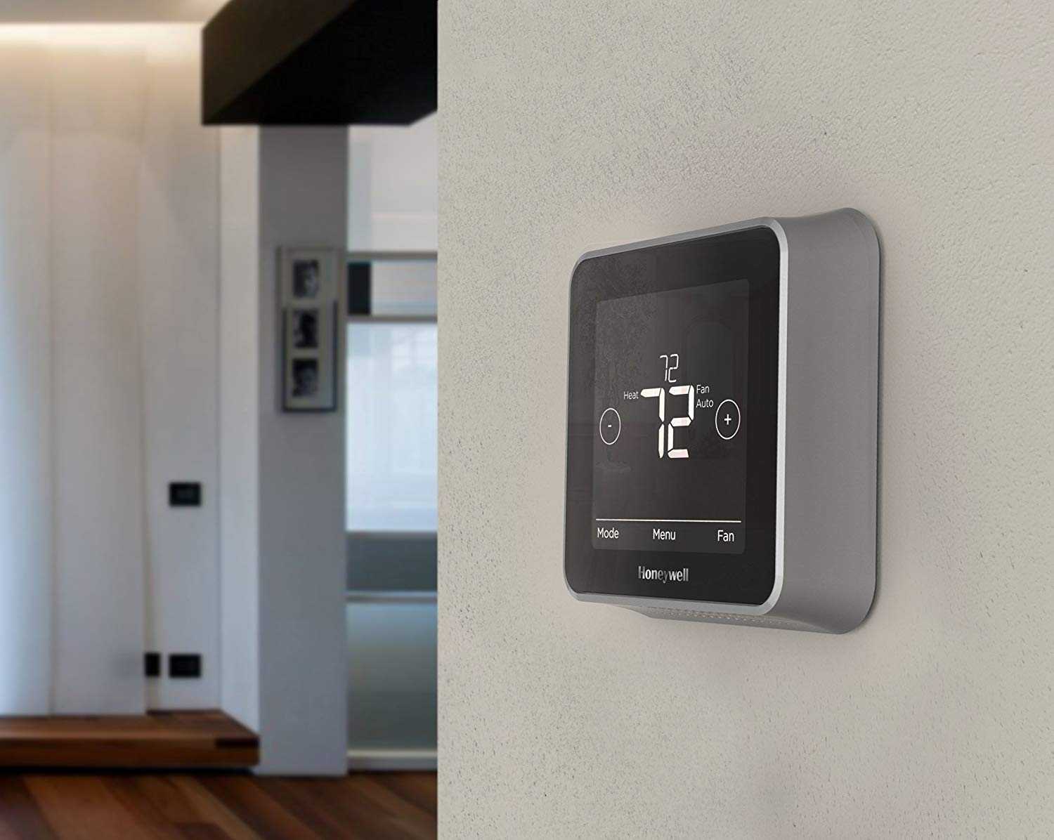 Honeywell Smart Thermostat on hallway wall.